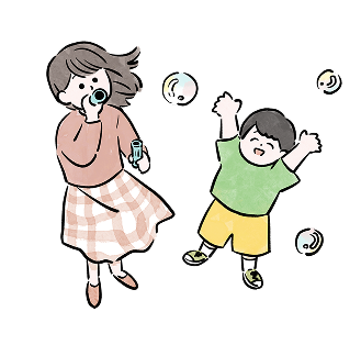 シャボン玉で遊ぶママと子供