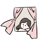 窓から外を眺めている女の子